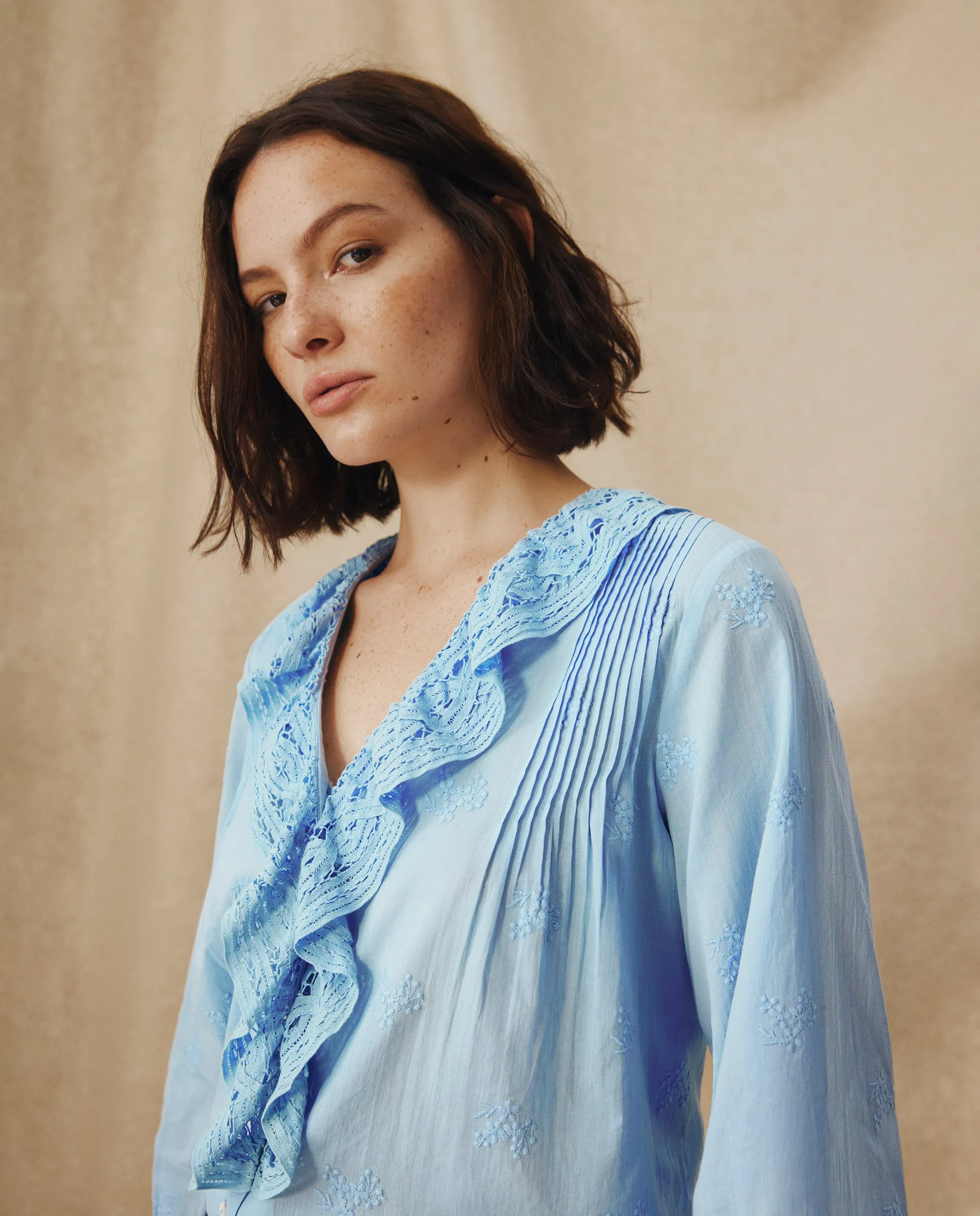 KAIRA | Pale Blue Embroidered Cotton Ruffle Blouse