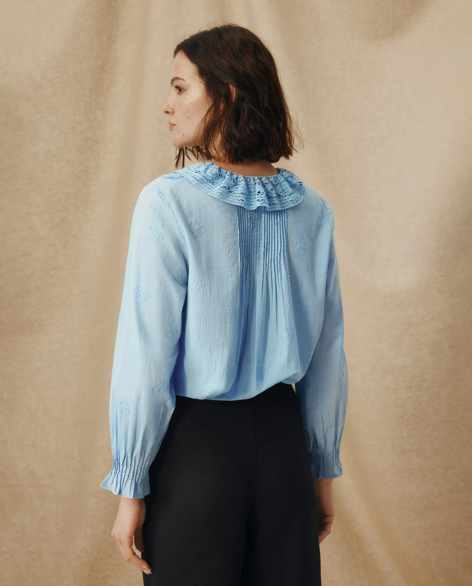 KAIRA | Pale Blue Embroidered Cotton Ruffle Blouse